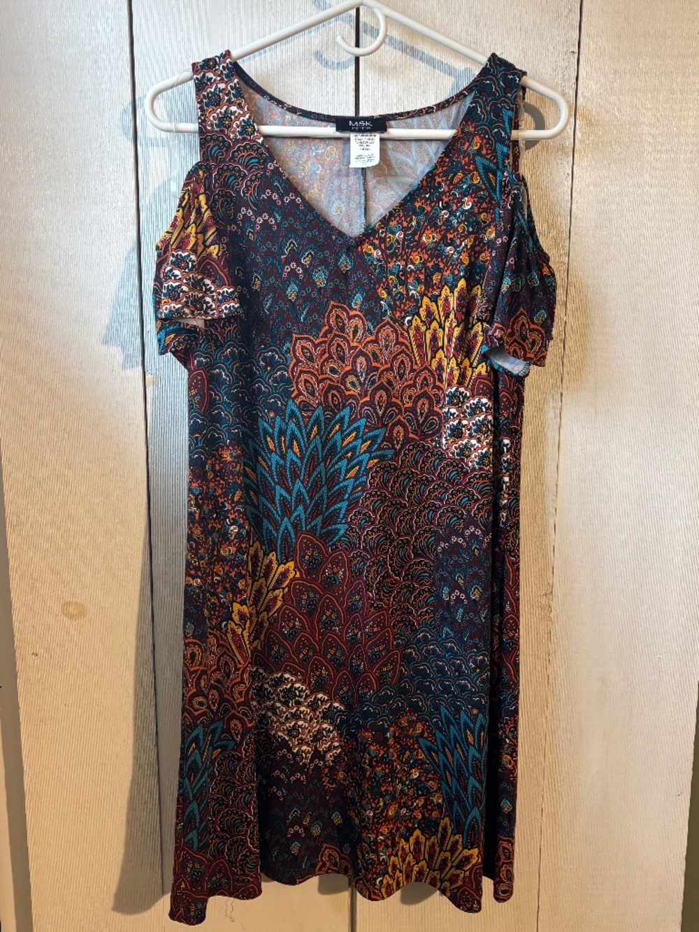 Colorful woman’s off the shoulder style dress